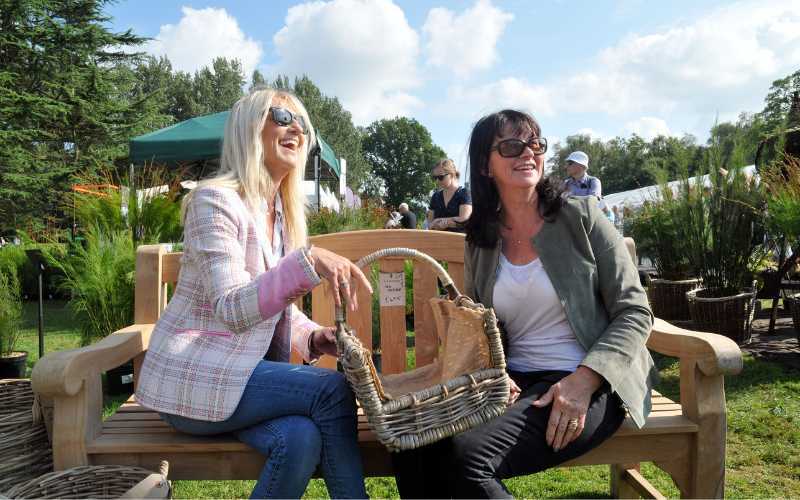 Ladies on a bench outdoor shopping